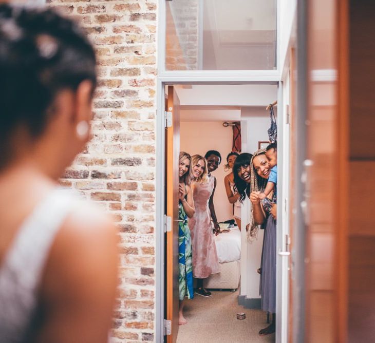 Bride and her bridal party getting ready together ahead of the big day