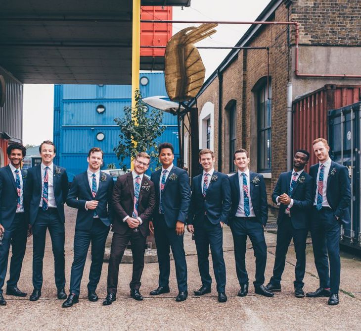 Groom and his groomsmen with handmade ties out of African print fabric