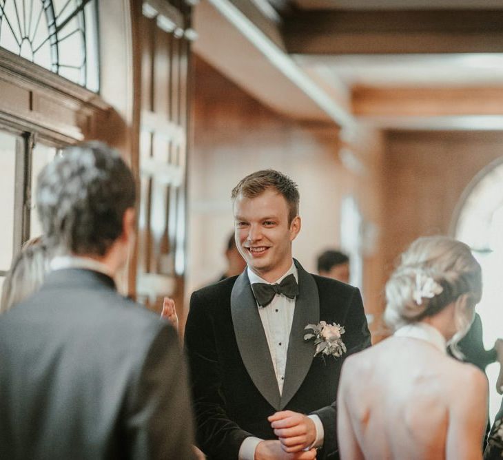 Bride And Groom Mingle With Guests