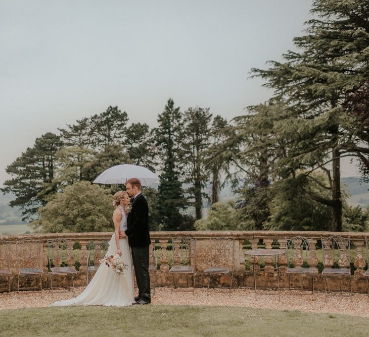 Bride And Groom In Coombe Lodge Grounds