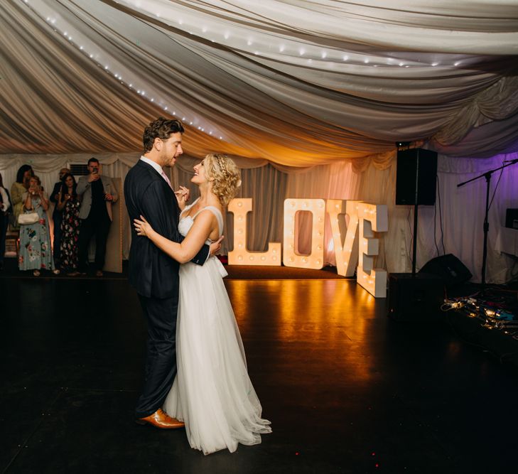 First Dance | Light up Letters | Northamptonshire wedding at Plum Park Hotel | Wtoo by Watters from Serendipity Brides | Spindleberry Flowers | Photography by Ania Ames