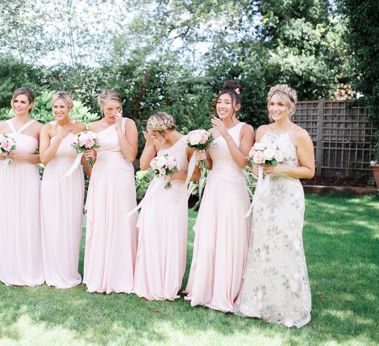 Bridal party first look in pink dresses