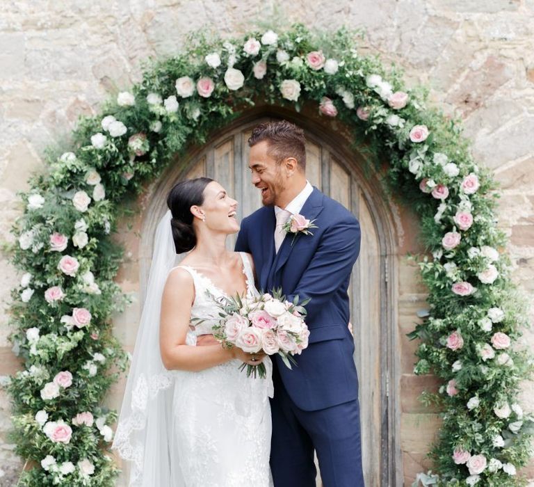 Bride and groom portrait outside the church