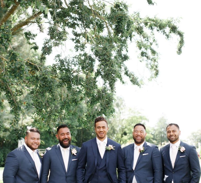 Groomsmen in navy suits at Coddington Vineyard wedding