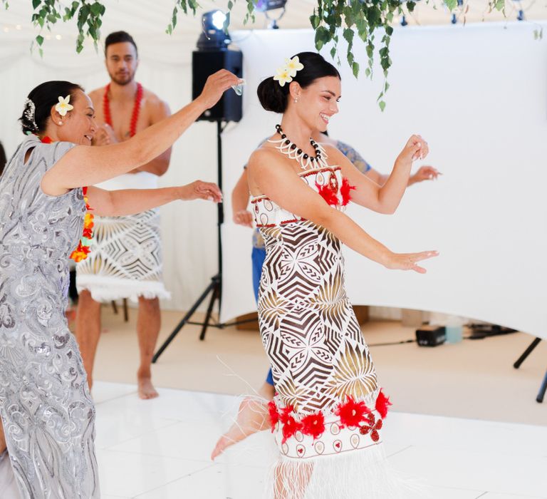 Bride performing a traditional Samoan dance for her groom