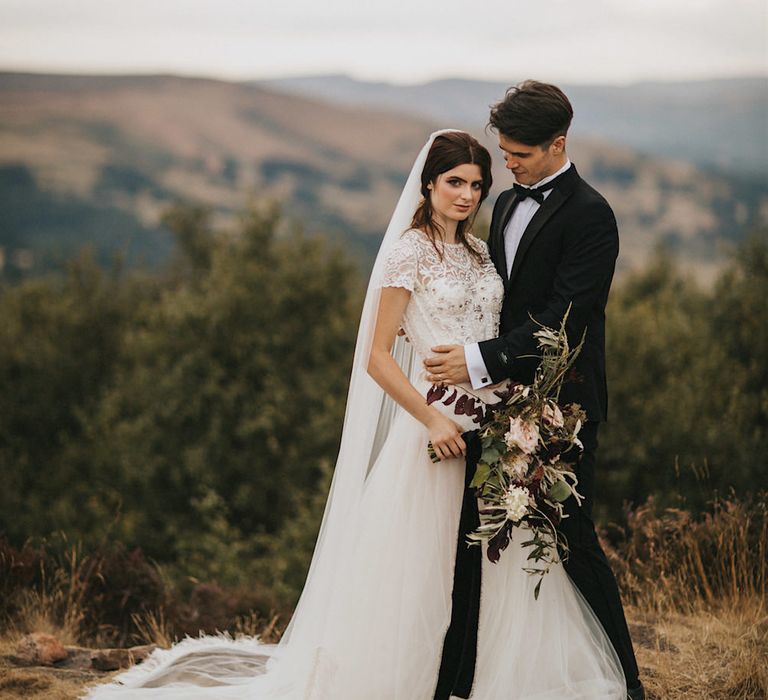 Burgundy Floral Bouquet &amp; Ribbon by Quintessential Wild Florist | Bride in Gown from Frances Day Bridal | Groom in Moss Bros. | Romantic, Bohemian Elopement in the Peaks by Natalie Hewitt Wedding Planner | Henry Lowther Photography