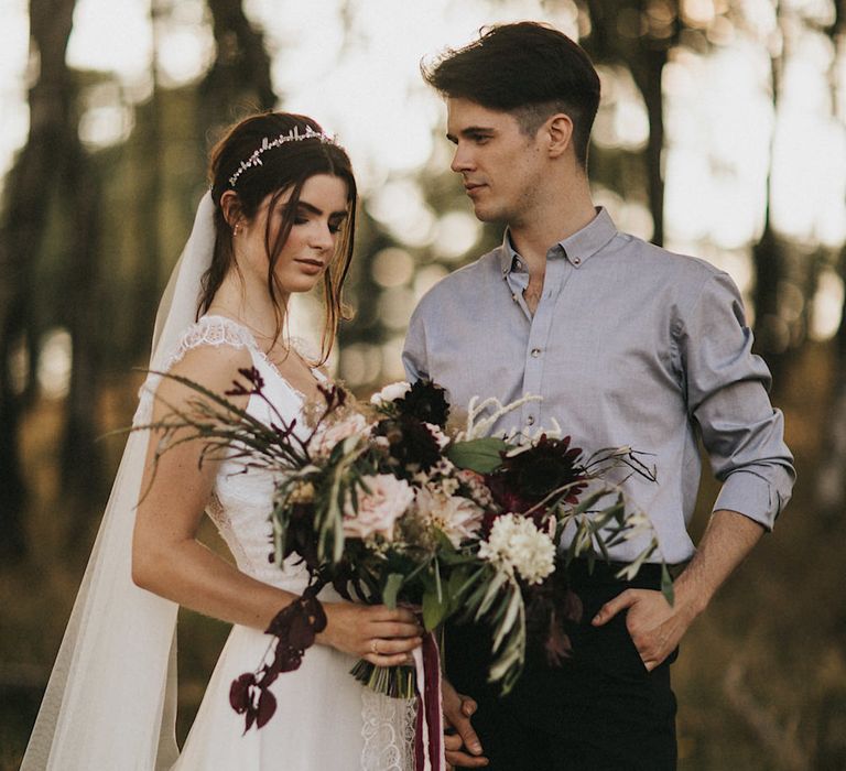 Burgundy Floral Bouquet &amp; Ribbon by Quintessential Wild Florist | Bride in Gown from Frances Day Bridal | Groom in Moss Bros. | Romantic, Bohemian Elopement in the Peaks by Natalie Hewitt Wedding Planner | Henry Lowther Photography