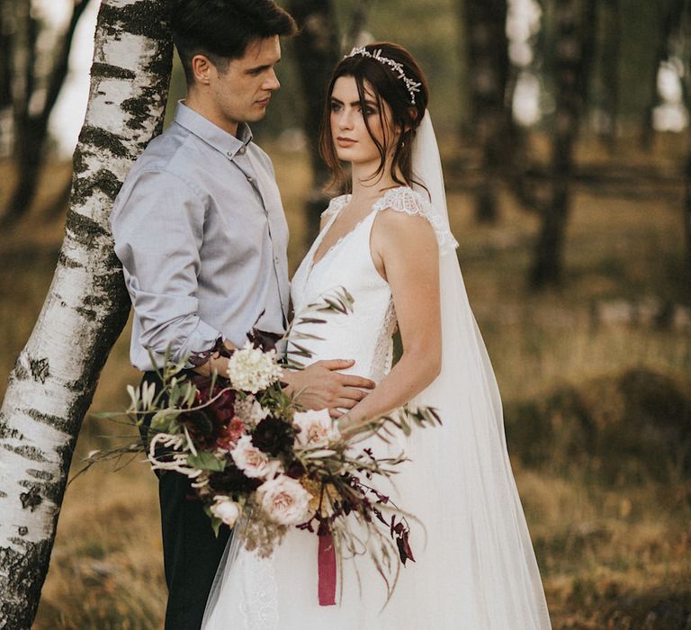 Burgundy Floral Bouquet &amp; Ribbon by Quintessential Wild Florist | Bride in Gown from Frances Day Bridal | Groom in Moss Bros. | Romantic, Bohemian Elopement in the Peaks by Natalie Hewitt Wedding Planner | Henry Lowther Photography