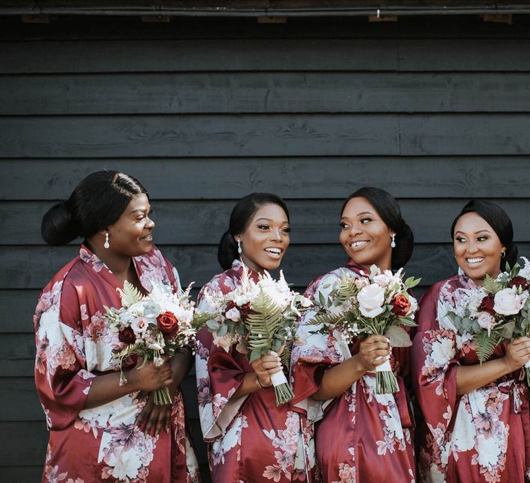 Bridesmaids on the wedding morning in floral getting ready robes