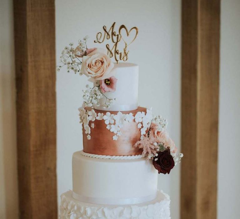 Classic four tier wedding cake on Tree stump cake stand