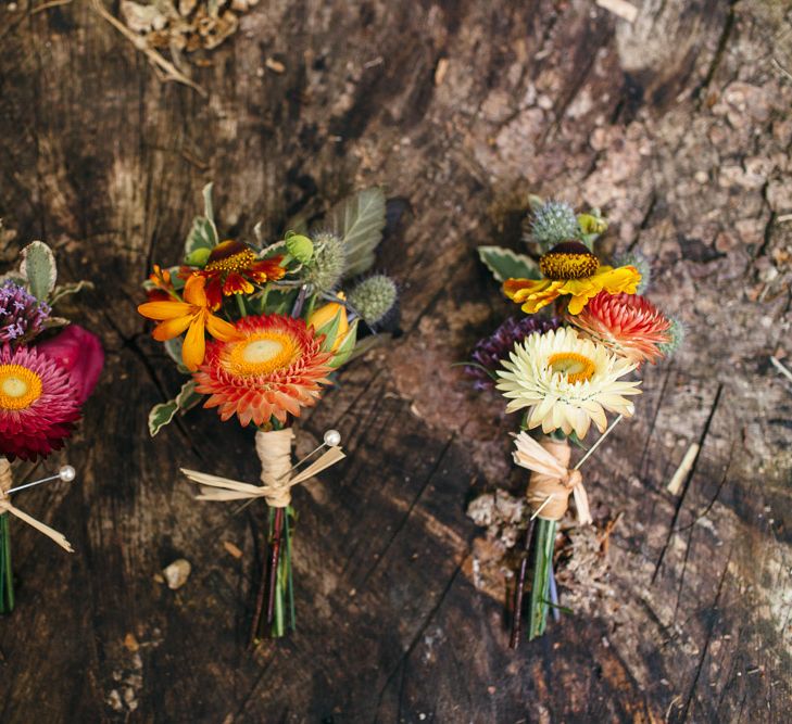 Colourful Buttonholes | Macrame Decor, Vintage Caravan Photobooth and Five-Tier Naked Wedding Cake for Boho Wedding in Woodlands | Freckle Photography