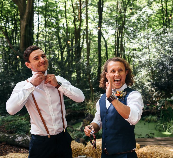 Groom in Blue Waistcoat and Trousers with Colourful Patterned Bow Tie | Groomsman in Shirt and Braces | Macrame Decor, Vintage Caravan Photobooth and Five-Tier Naked Wedding Cake for Boho Wedding in Woodlands | Freckle Photography