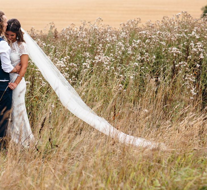 Bride in Lenora Dress by Wtoo Watters with Lace Cap Sleeves and Keyhole Back | Groom in Blue Waistcoat and Trousers with Colourful Patterned Bow Tie | Macrame Decor, Vintage Caravan Photobooth and Five-Tier Naked Wedding Cake for Boho Wedding in Woodlands | Freckle Photography