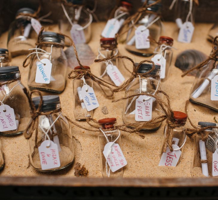 Wooden Crate Filled with Sand and Bottles | Message in a Bottle | Macrame Decor, Vintage Caravan Photobooth and Five-Tier Naked Wedding Cake for Boho Wedding in Woodlands | Freckle Photography