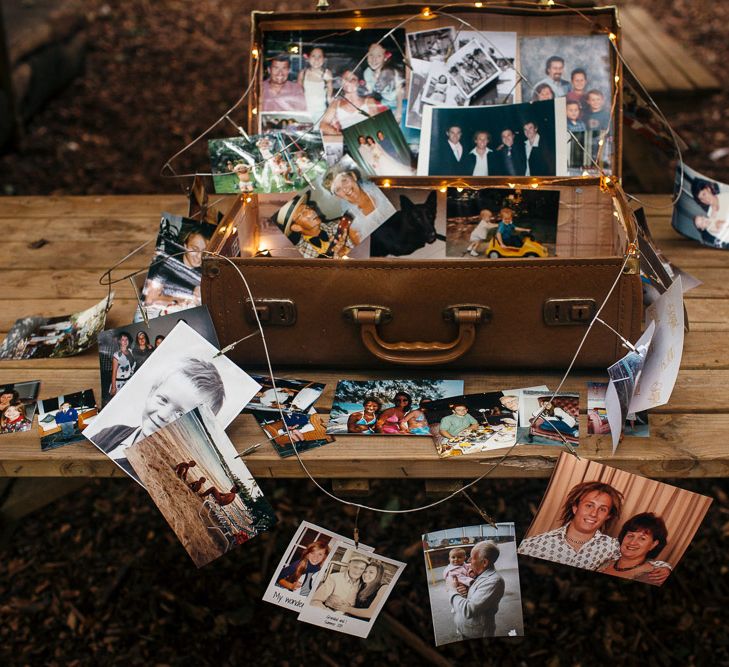 Vintage Suitcase with Family Photos | Macrame Decor, Vintage Caravan Photobooth and Five-Tier Naked Wedding Cake for Boho Wedding in Woodlands | Freckle Photography