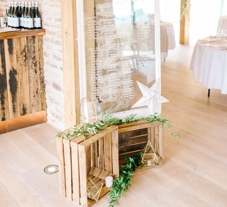 Wedding Reception Decor | Perspex Table Plan |  Crates and Foliage | Hazel Gap Barn Wedding with Bride Arriving by Kit Car | Sarah-Jane Ethan Photography