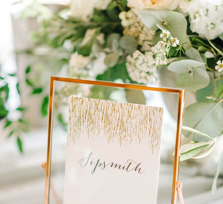 Wedding Reception Decor | Table Name | Copper Frame | White Flowers and Green Foliage |  Hazel Gap Barn Wedding with Bride Arriving by Kit Car | Sarah-Jane Ethan Photography