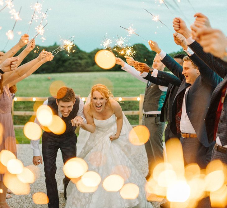 Sparklers | Bride in Strapless Sassi Holford Ballgown Wedding Dress with Belt | Groom in Blue Check Paul Smith Suit | Hazel Gap Barn Wedding with Bride Arriving by Kit Car | Sarah-Jane Ethan Photography