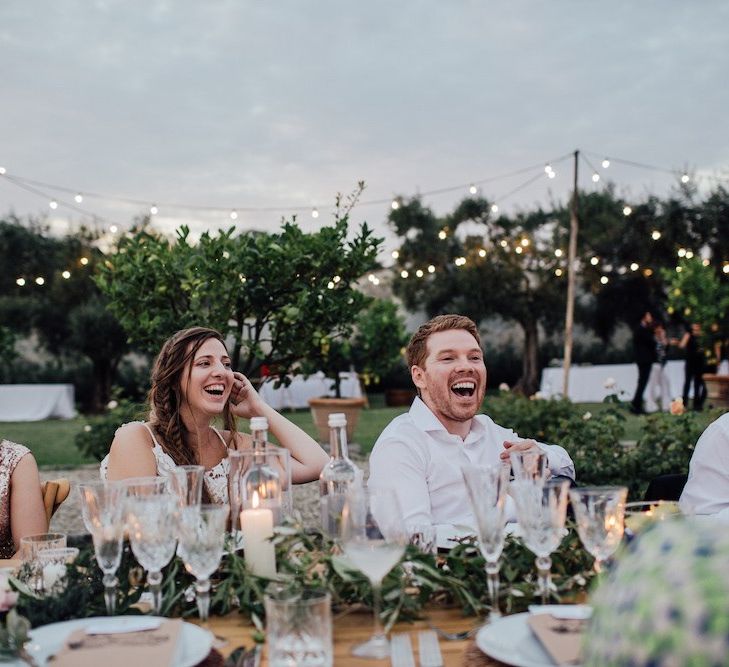 Bride and Groom Enjoy Speeches