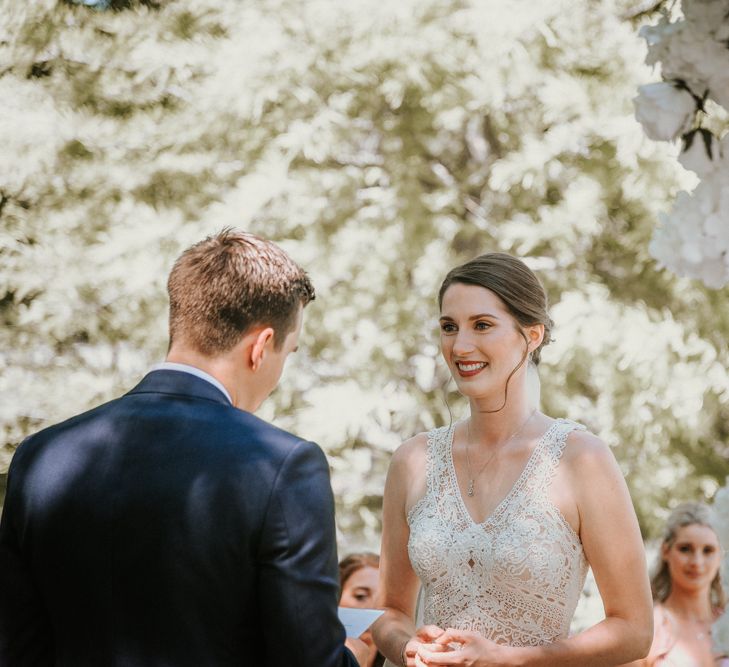 Wedding Ceremony with Bride in Pronovias Danaia Wedding Dress and Groom in Navy Moss Bros. Suit