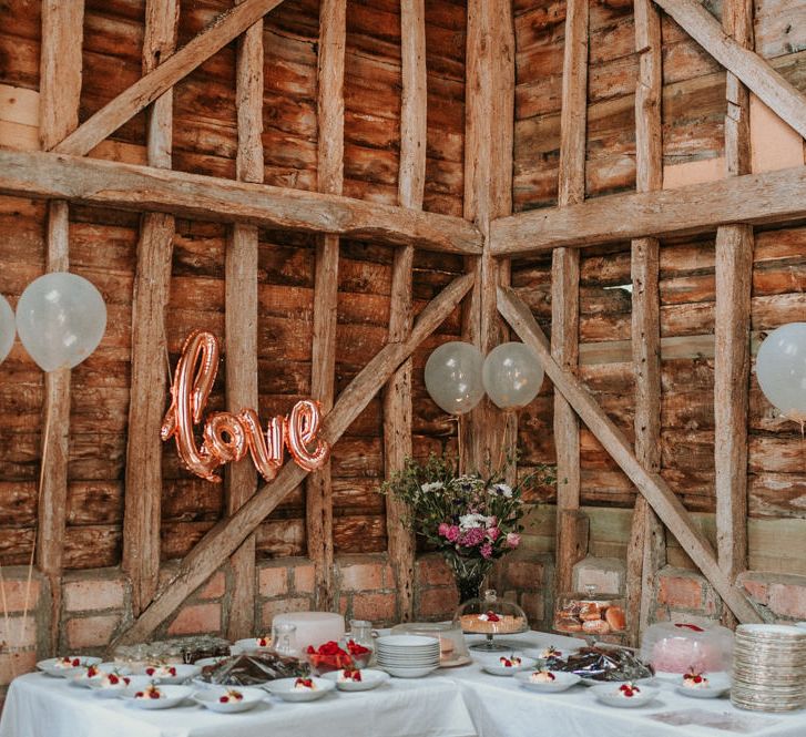 Homemade Cake Table with Foil Love Balloon Decor