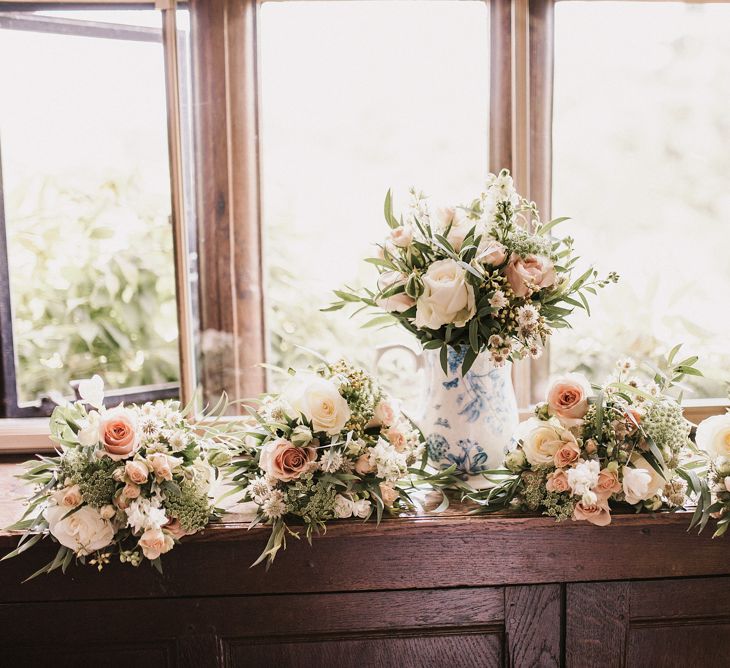 White, Pink and Foliage Wedding Bouquets