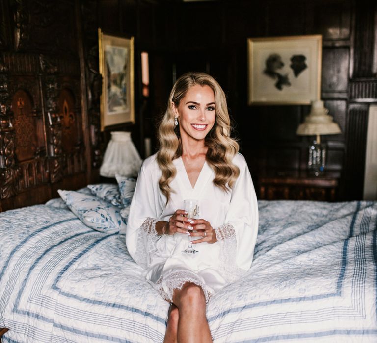 Bride on Wedding Morning in White Getting Ready Robe and Finger Wave Hair