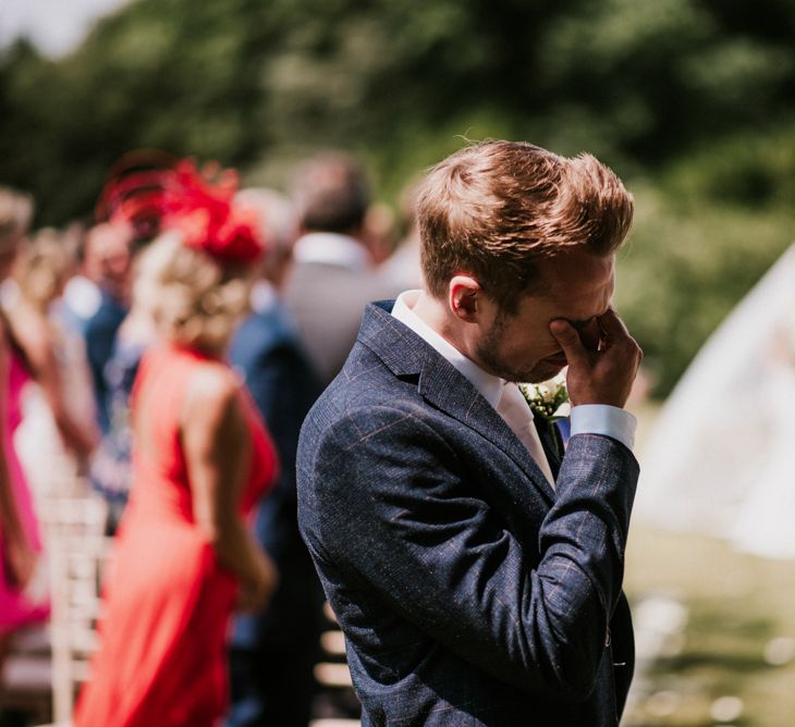 Emotional Groom in Check Moss Bros. Suit at the Altar