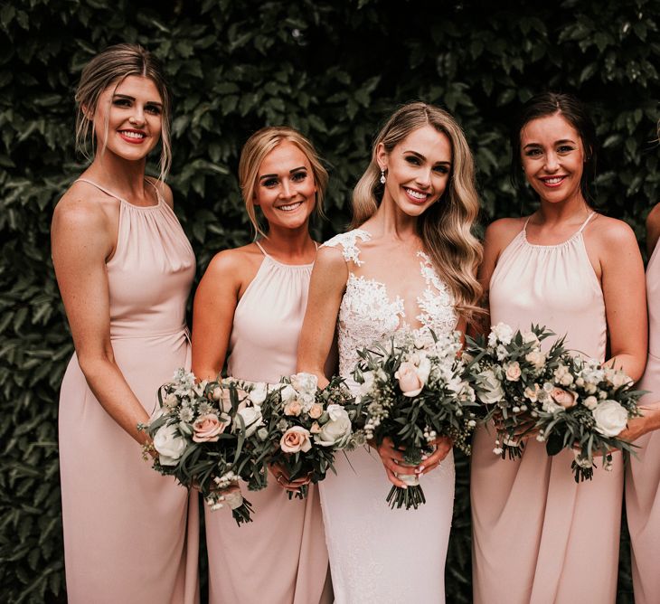 Bridal Party with Bridesmaids in Halterneck Pink Shona Joy Dresses and Bride in Pronovias Wedding Dress