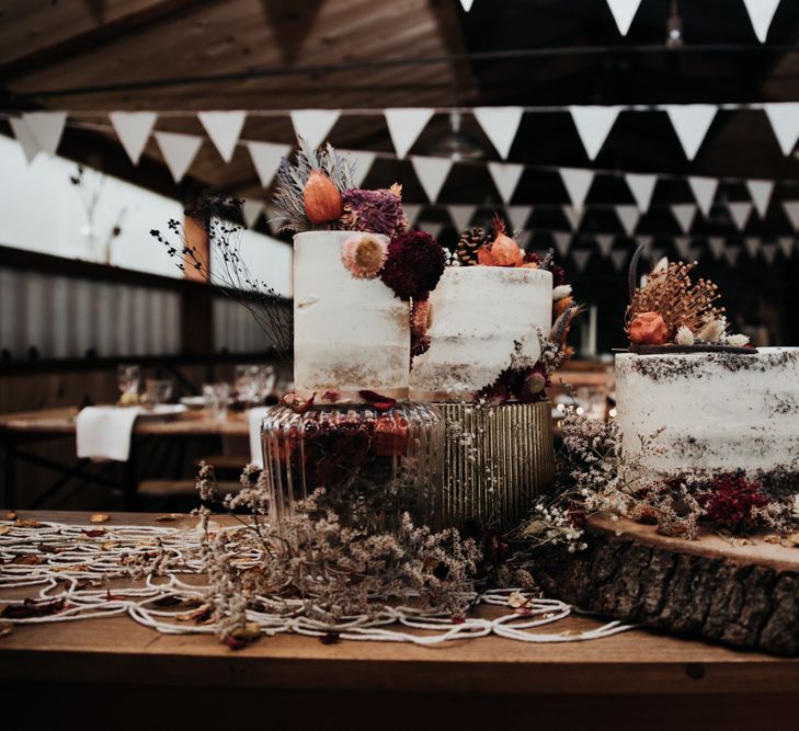 Rustic Wedding Cake Display with Tree Slice Cake Stand and Semi Naked Wedding Cake