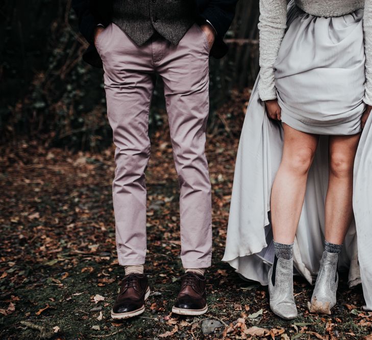 Stylish Bride in Silver Boots and Groom in Pink Chinos