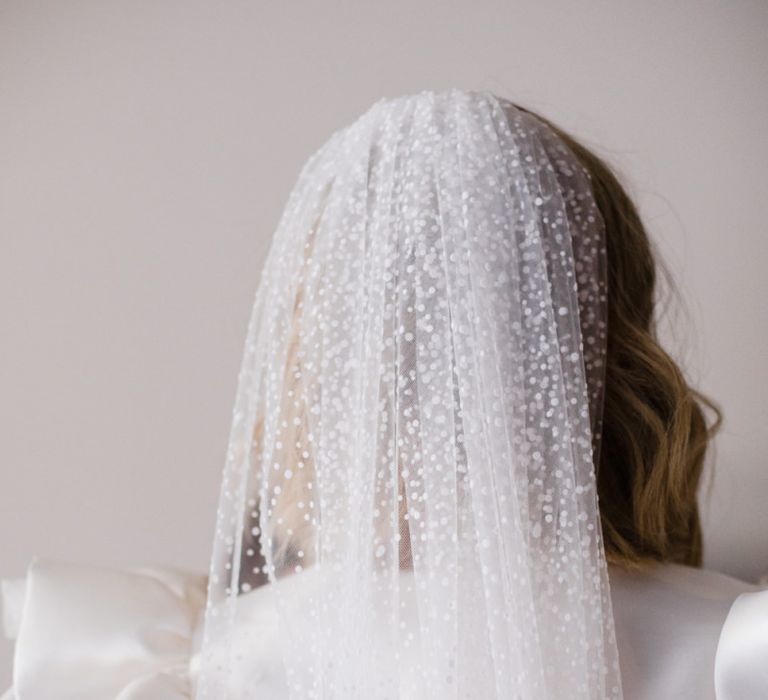 Polka dot bride veil with white bridesmaid dresses