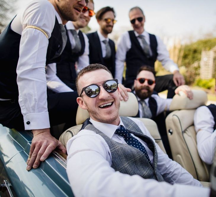 Groomsmen in wedding car