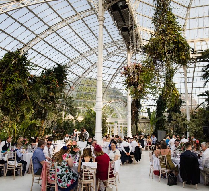 Wedding in palm house Sefton Park in Liverpool with white bridesmaid dresses