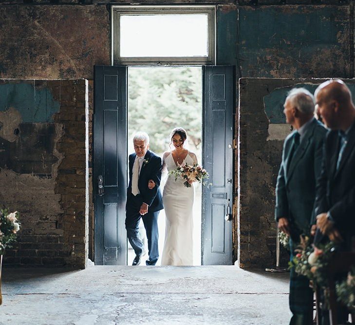 Guests at Ceremony with Dusky Pink Bridesmaid Dresses