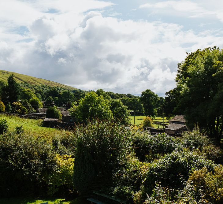 Brightly Coloured Festival Wedding with Outdoor Humanist Ceremony &amp; Tipi Reception on the Yorkshire Dales | Boho Bride in Daughters of Simone Wedding Dress from Ghost Orchid Bride Boutique | Bridesmaids in Blush Separates | Groomsmen in Tweed | Tim Dunk Photography