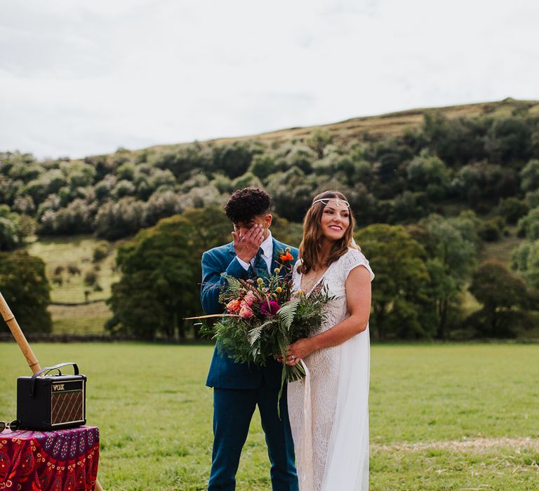 Wedding Ceremony |  Bride in Daughters of Simone Lace Gown | Groom in Tweed Suit | Brightly Coloured Festival Wedding with Outdoor Humanist Ceremony &amp; Tipi Reception on the Yorkshire Dales | Tim Dunk Photography