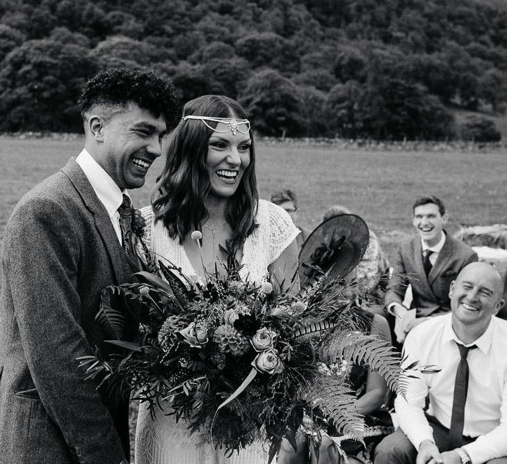 Wedding Ceremony |  Bride in Daughters of Simone Lace Gown | Groom in Tweed Suit | Brightly Coloured Festival Wedding with Outdoor Humanist Ceremony &amp; Tipi Reception on the Yorkshire Dales | Tim Dunk Photography