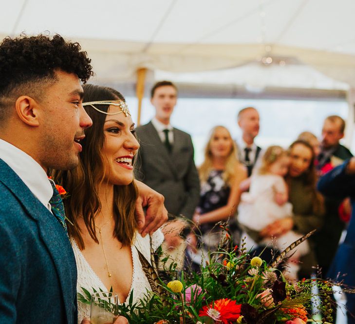 Wedding Ceremony |  Bride in Daughters of Simone Lace Gown | Groom in Tweed Suit | Brightly Coloured Festival Wedding with Outdoor Humanist Ceremony &amp; Tipi Reception on the Yorkshire Dales | Tim Dunk Photography