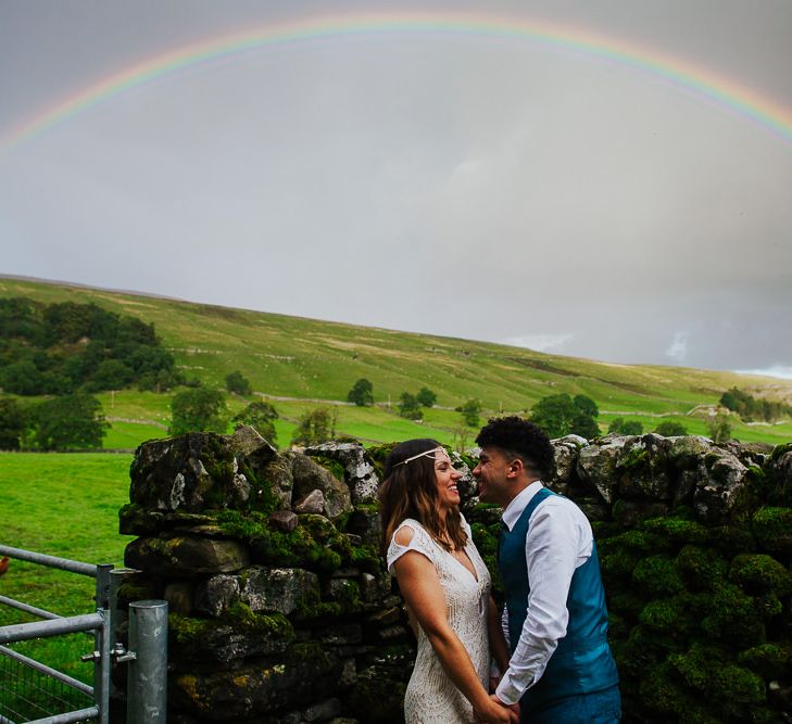 Rainbow | Bride in Daughters of Simone Lace Gown | Groom in Tweed Suit | Brightly Coloured Festival Wedding with Outdoor Humanist Ceremony &amp; Tipi Reception on the Yorkshire Dales | Tim Dunk Photography