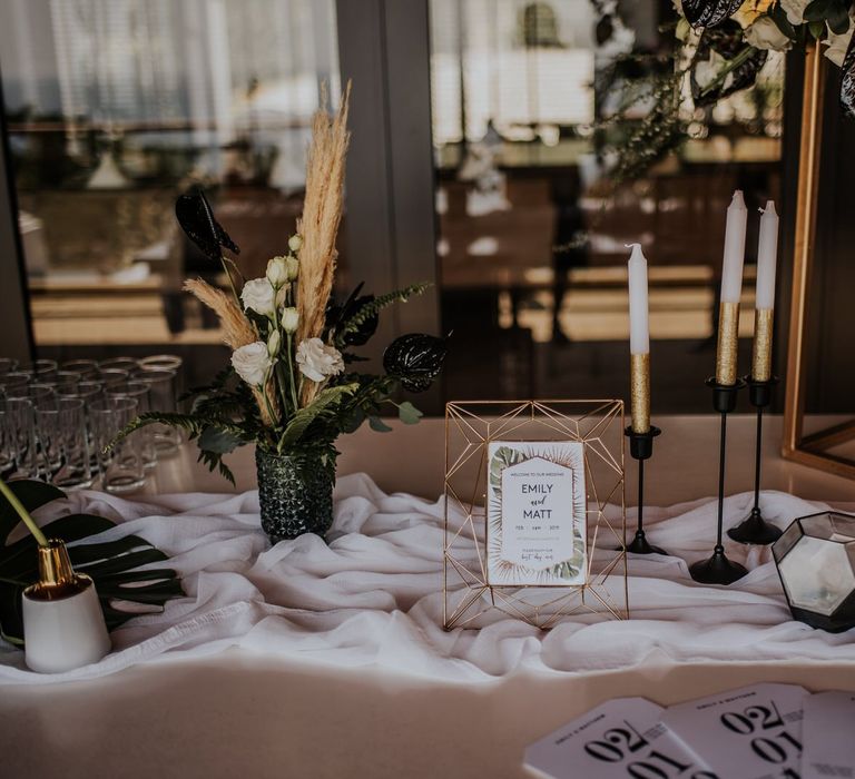 Wedding welcome table with candles