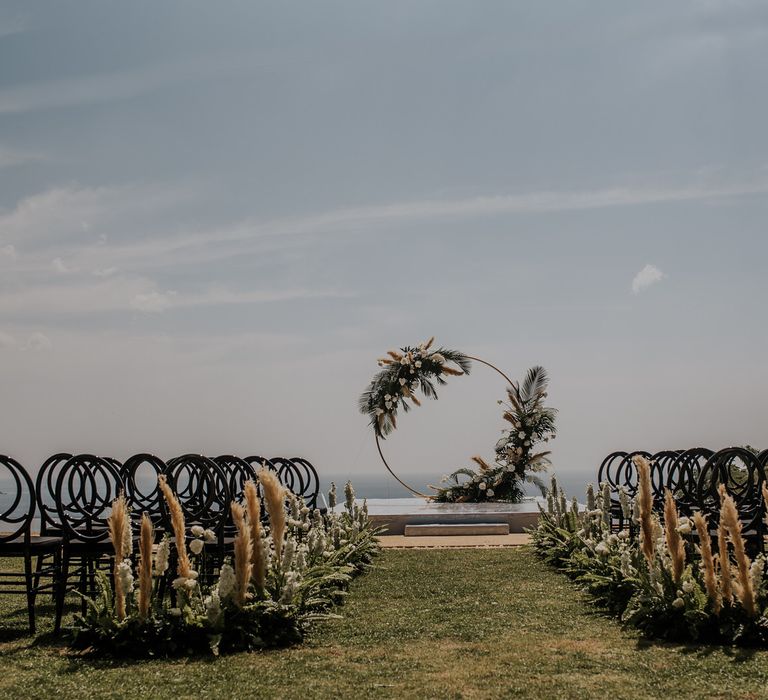 Stunning wedding ceremony set up with moon gate for Thailand wedding