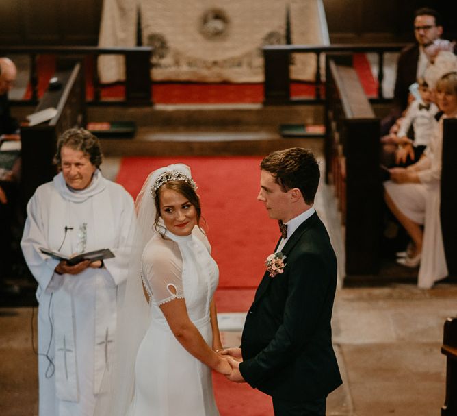 Bride and Groom Exchanging Their Wedding Vows