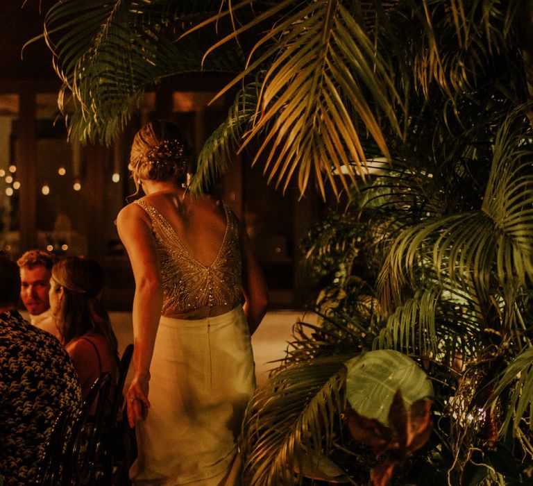 Bride in beaded bodysuit with skirt at Thailand wedding