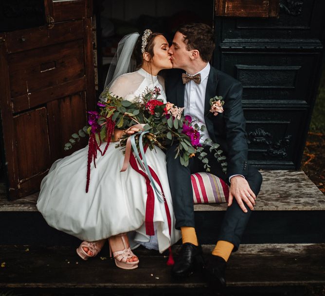 Bride and Groom Kissing at Their Askham Hall Wedding