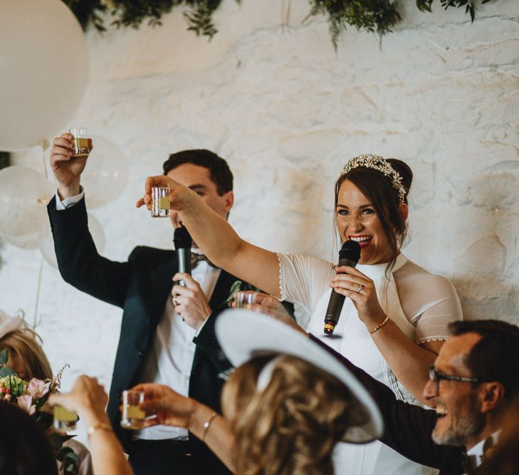 Bride and Groom Shot Toast at Askham Hall Wedding Reception