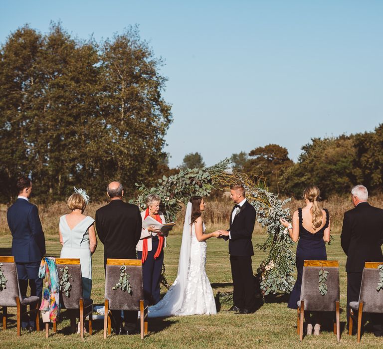 Outdoor intimate ceremony with seven guests