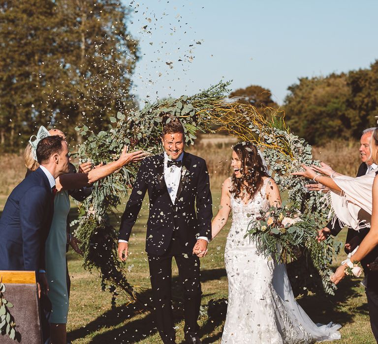 Eucalyptus leaf heart shaped confetti at intimate ceremony with seven guests