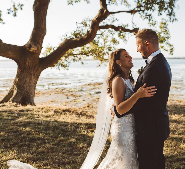 Bride and groom steal a moment and enjoy golden hour together