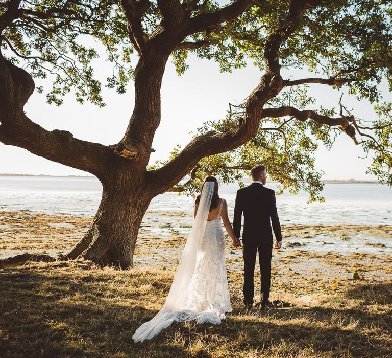 Bride and groom wearing Made With Love Bridal Dress at intimate wedding